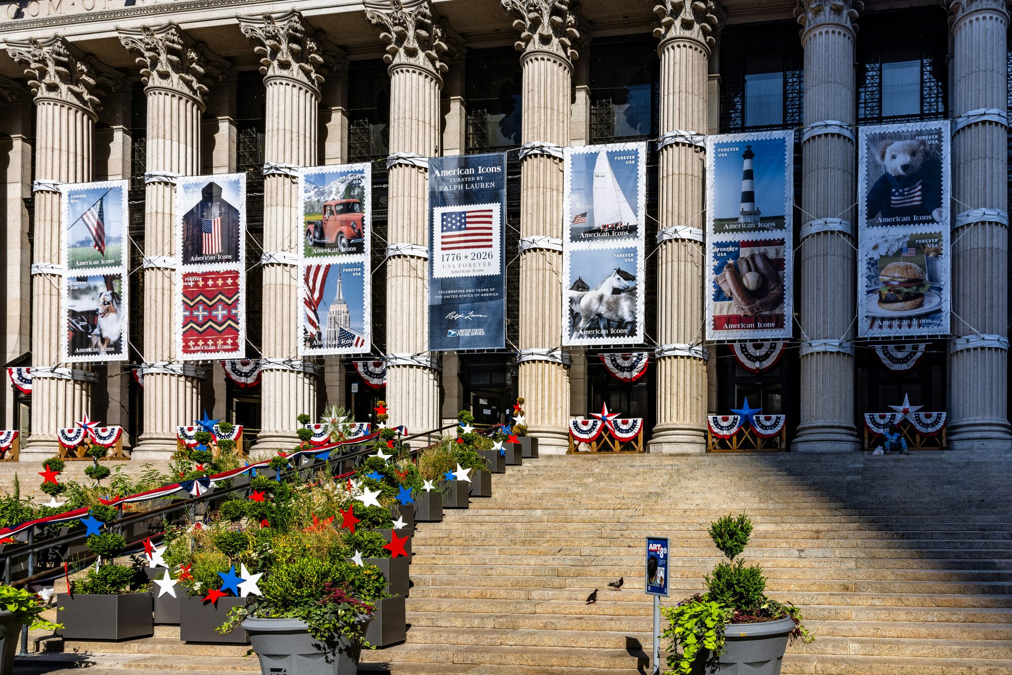 Banners of American icons hung on neoclassical columns
